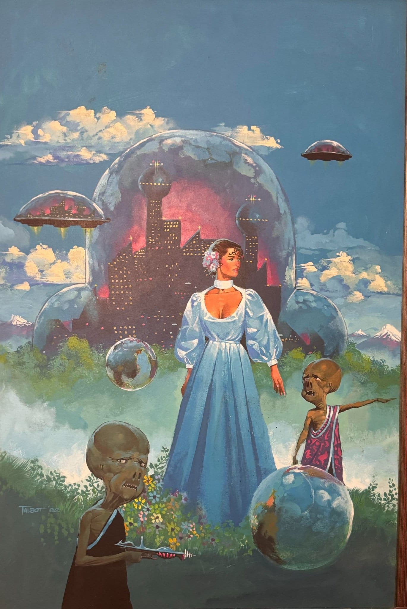 A woman in a white dress stands among flowers and grass under a blue sky. Behind her is a domed city of dark buildings amid a pinkish light. A few bubbles are floating near her, along with two small aliens wearing tunics, one of whom holds a ray gun.