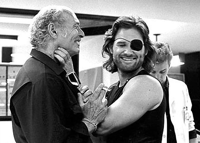 Kurt Russel plays around with John Carpenter while in costume as Snake Plissken.